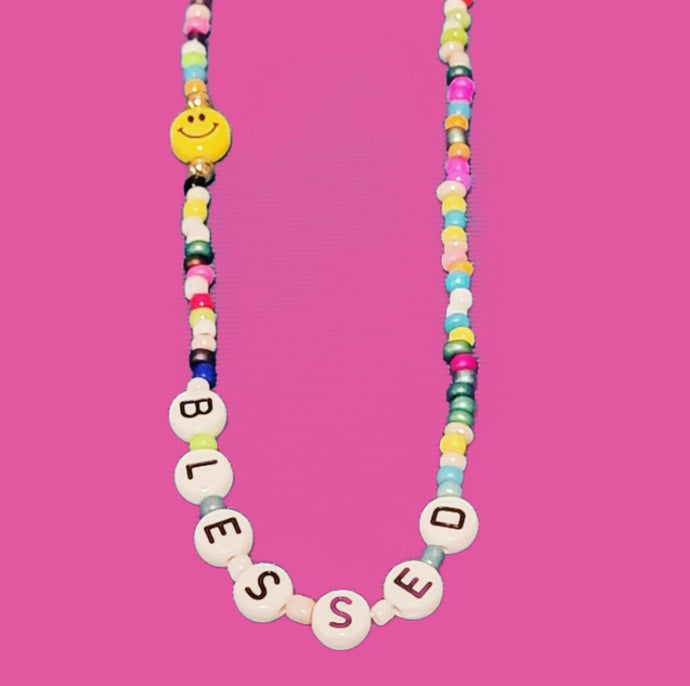 Necklace multi color that says blessed